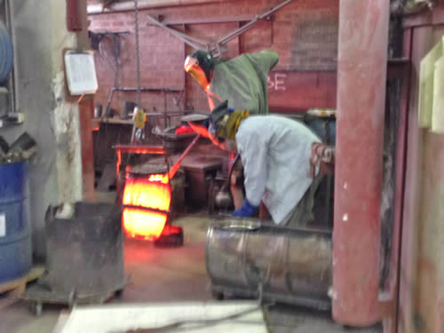 St Patrick sculpture - molten bronze pouring